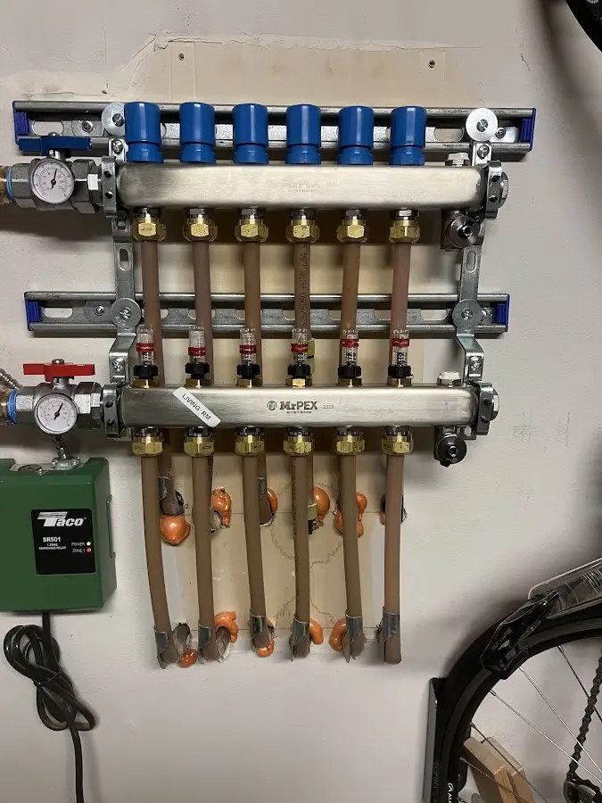 Plumber performing Leak Detection at a residential property in Somers